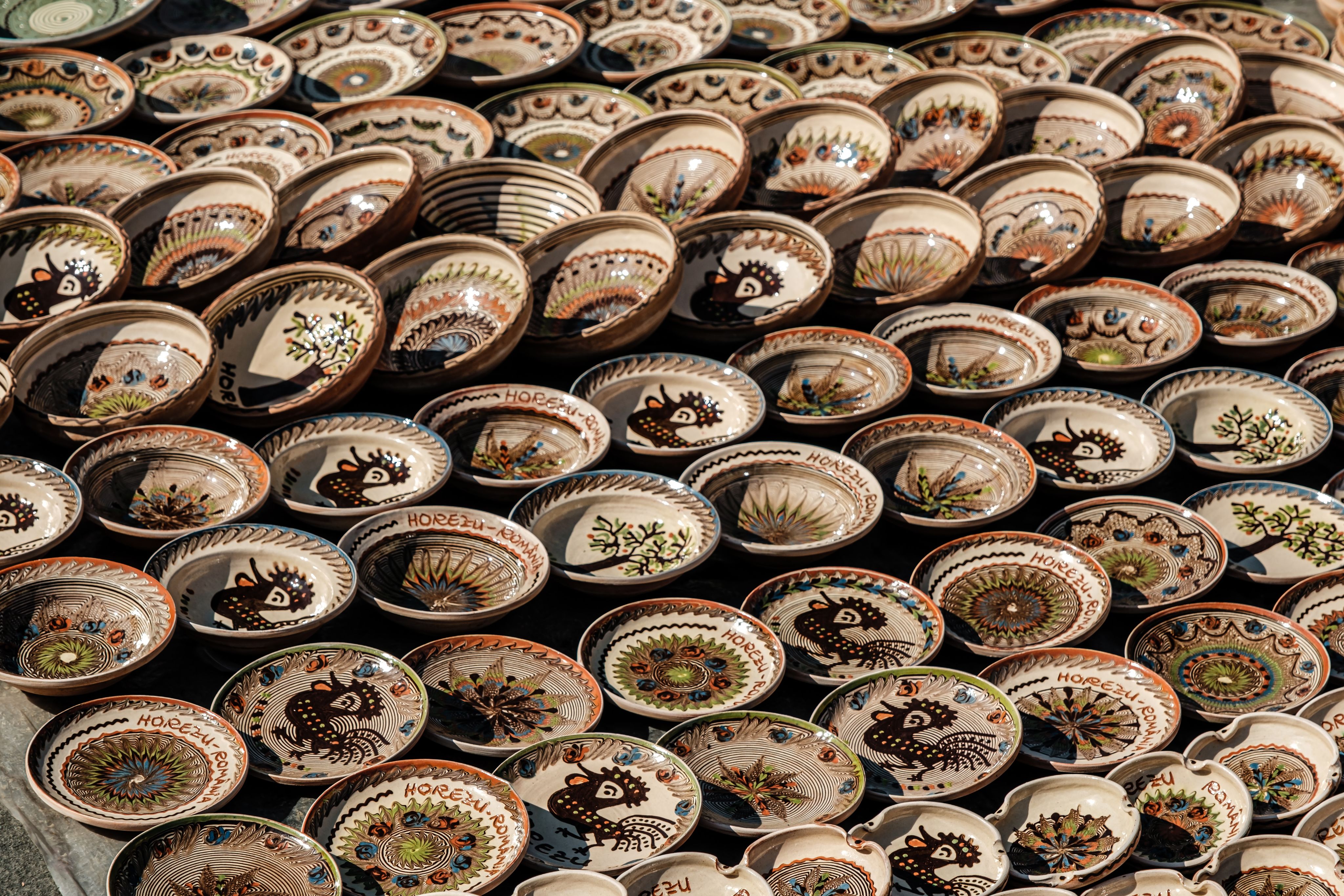 white and brown ceramic round plate lot