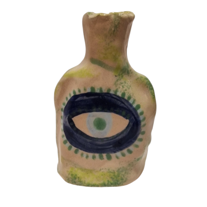 Bottle with painter blue and green eye
