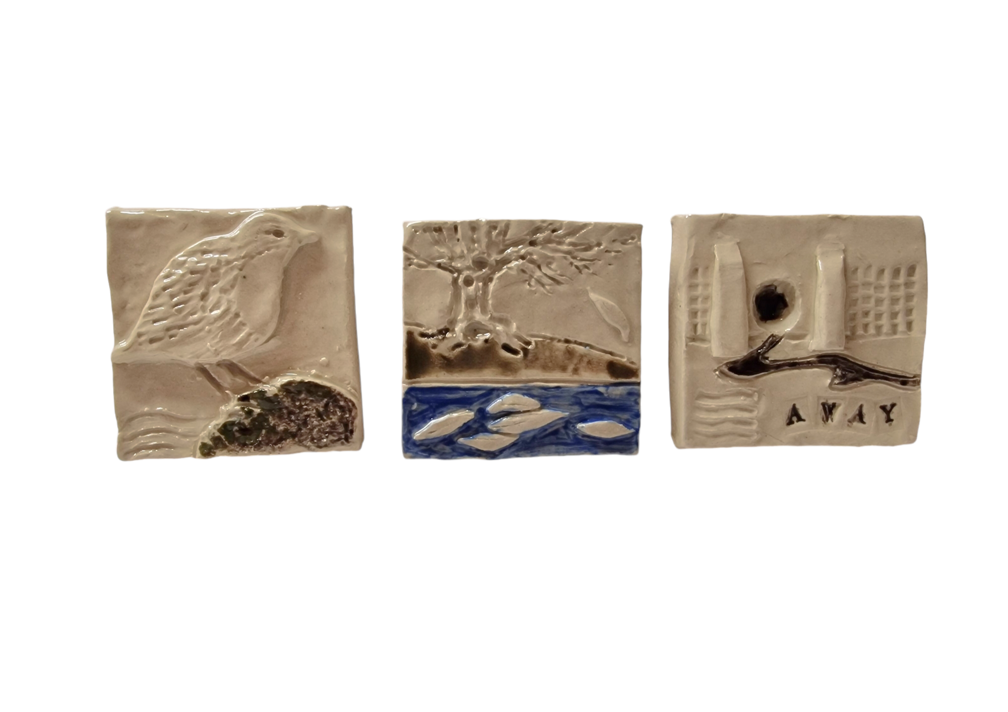 Three square tiles show bird, tree by the river and textured shapes with the words AWAY printed