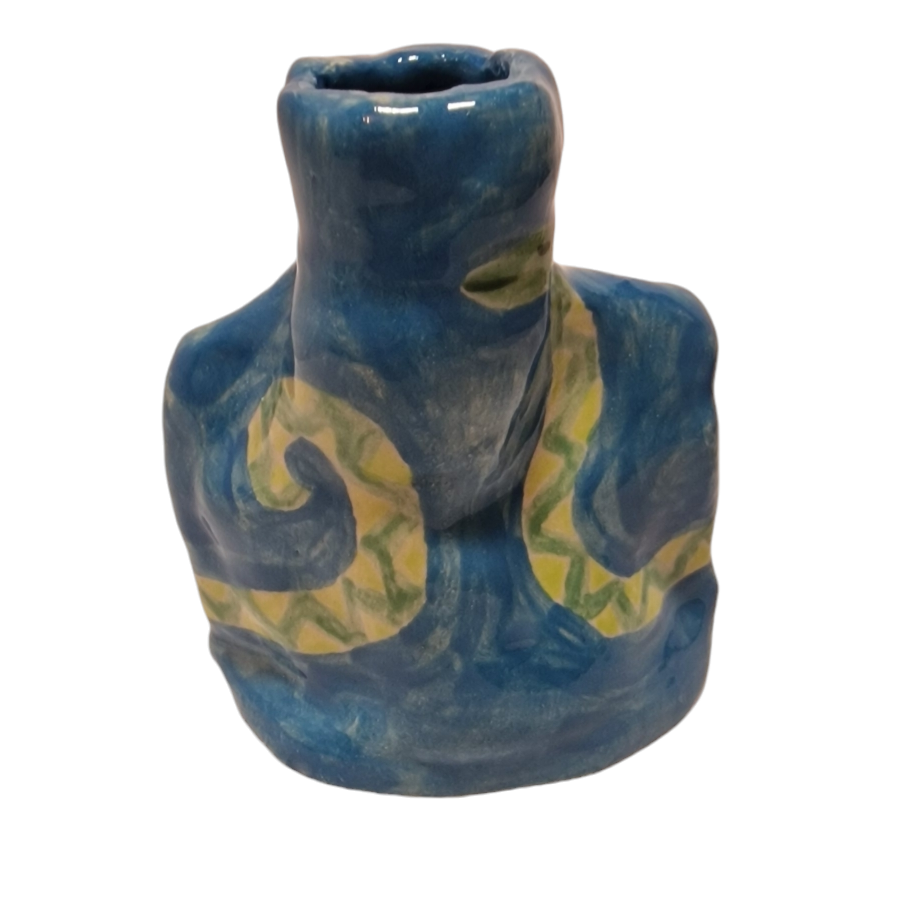 Blue bottle with worm like creature