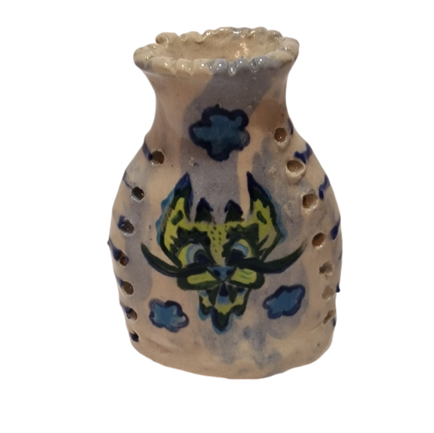 Bottle with painted green dragon head and blue abstract smoke shapes