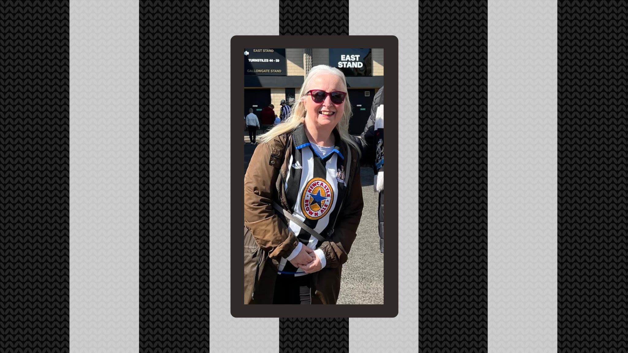 Photo of Sue in her Newcastle shirt stood outside St James' Park.