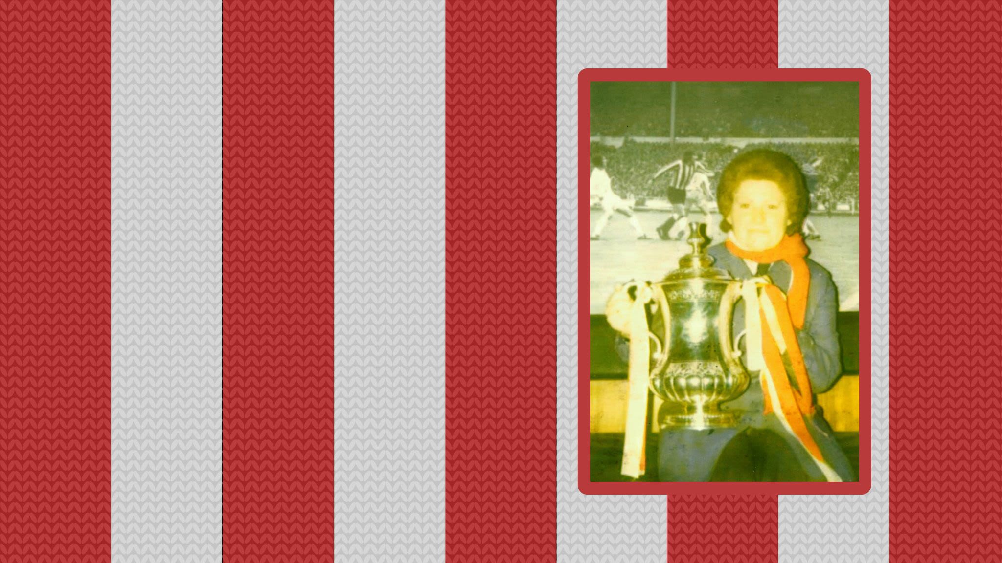 Photo of a Sunderland fan (Anne) wearing a red and white scarf and holding the FA Cup
