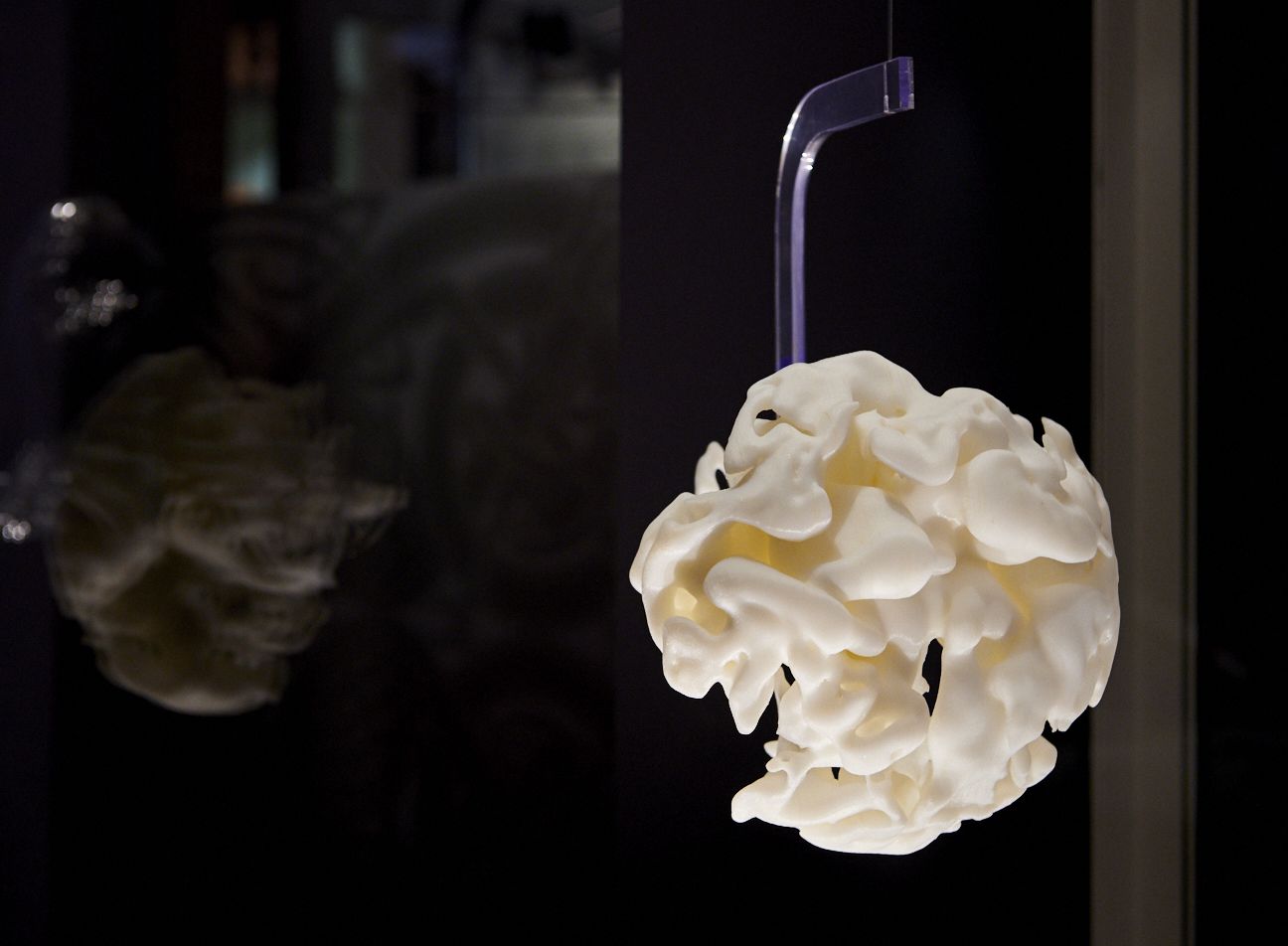Intricate white plastic sculpture created by Jayne Wilton