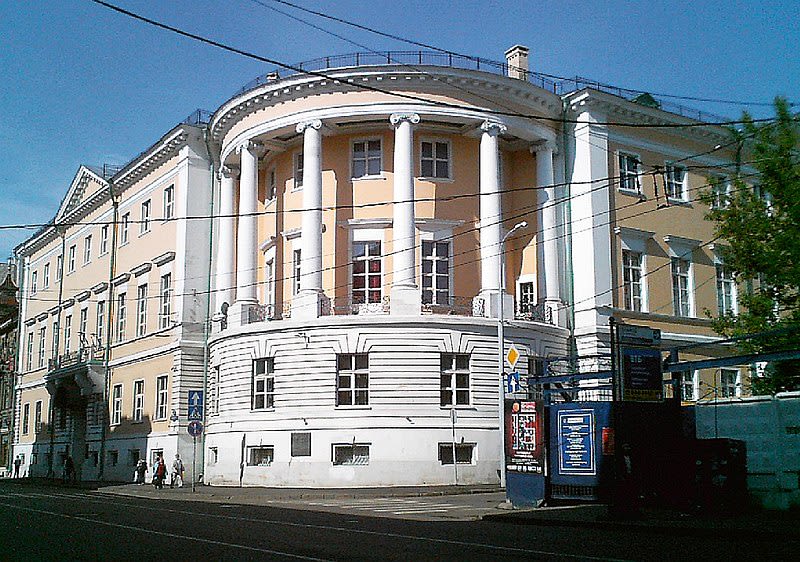 Large white building with decorative columns