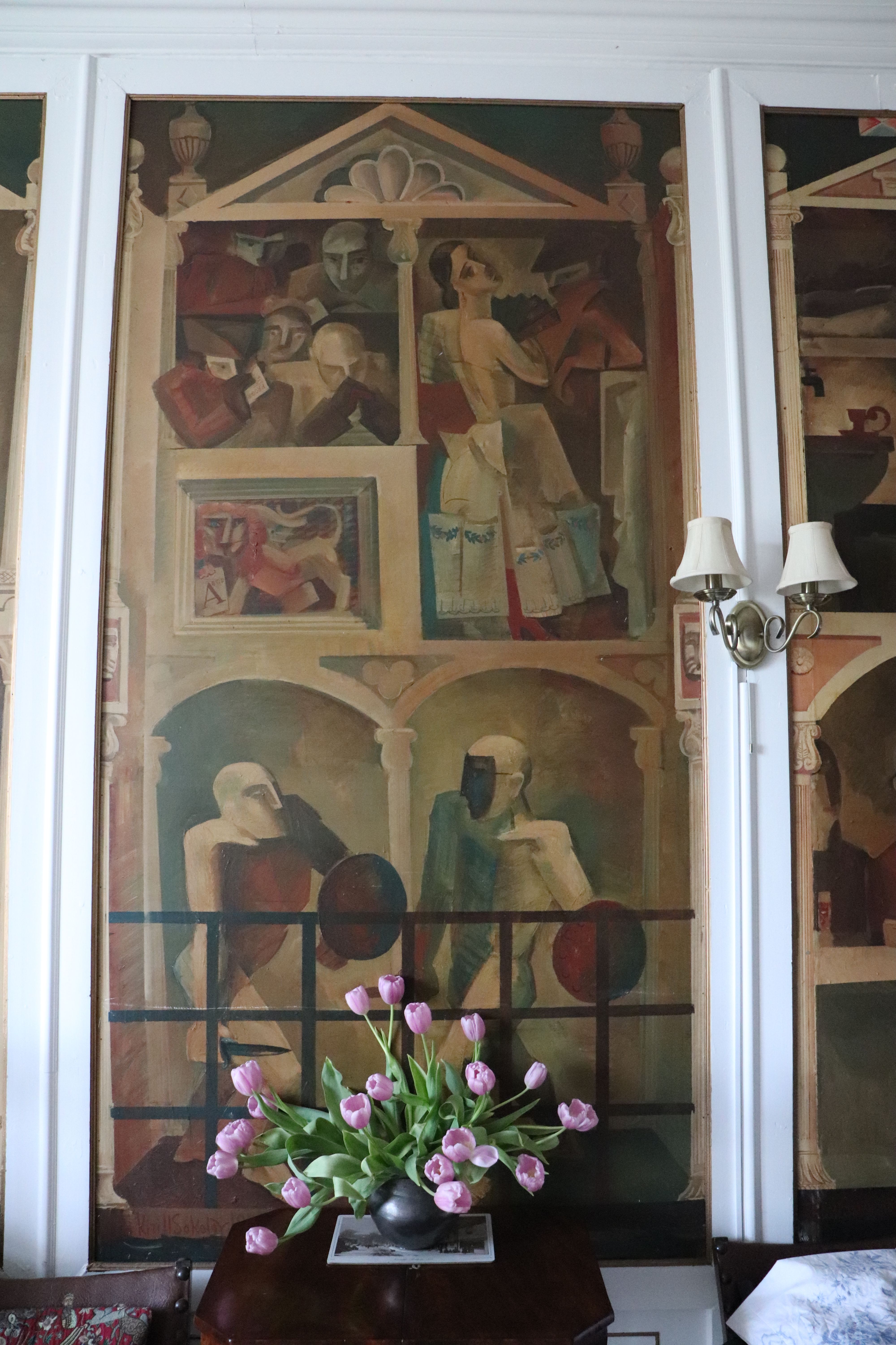 Photograph of colorful painting on the wall.
