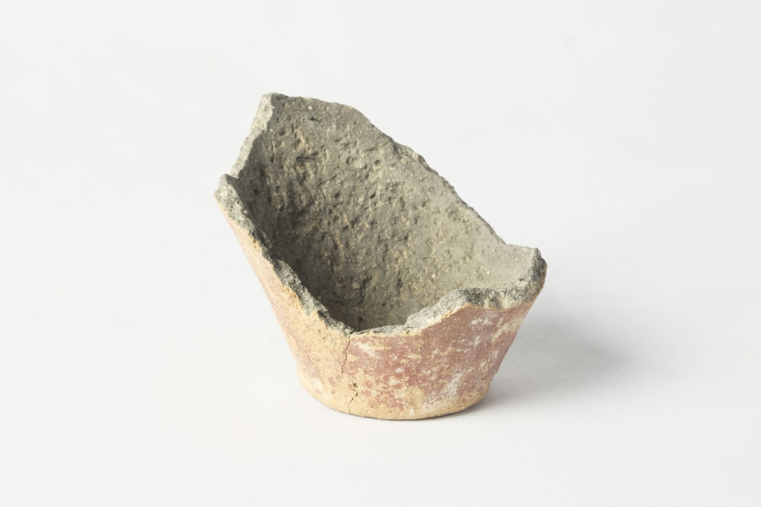 Base section of a vessel with a narrow base and wide body