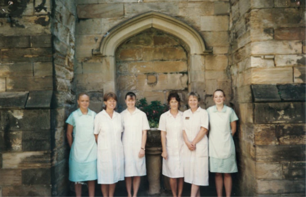 Lynne and her colleagues in the Castle Courtyard at the beginning of her career